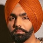 पंजाबी सिंगर-एक्टर एमी विर्क पर फायरिंग:कनाडा में शो के बाद कार पर हमला; एमी सुरक्षित, हमलावरों ने बचने के लिए अपनी SUV भी फूंकी